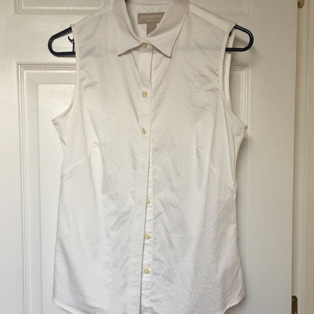 Sleeveless button down dress top